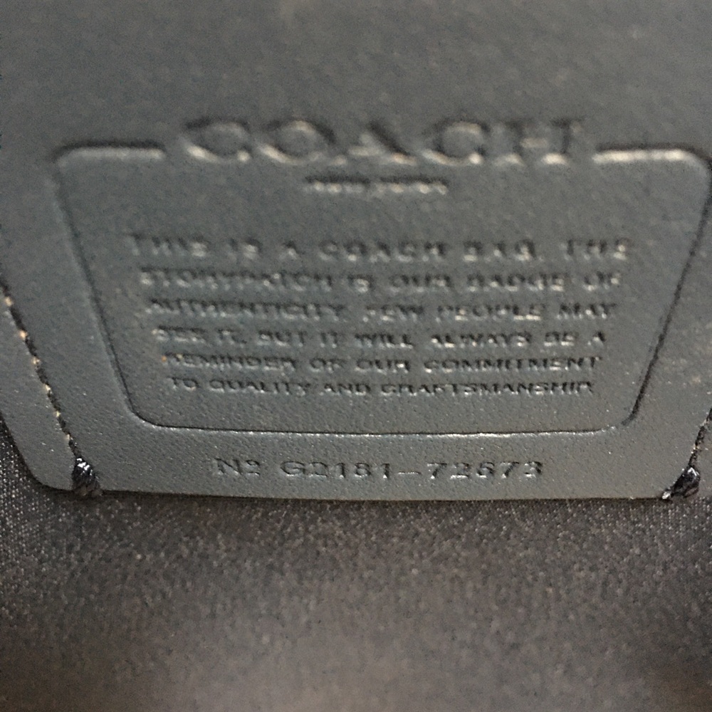 Coach winter white leather bag. Never used. Great condition.